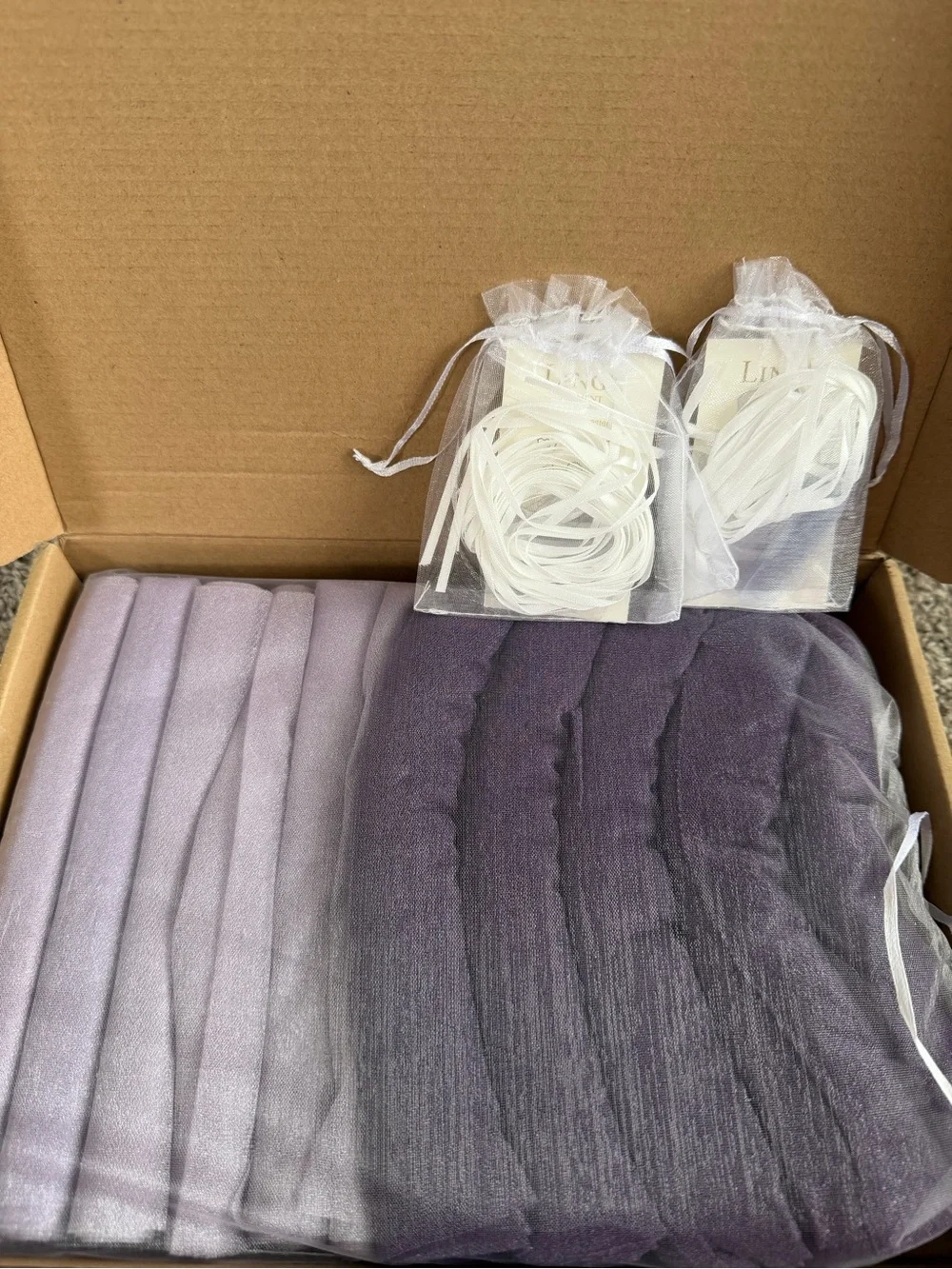 Ling’s Moment lilac and purple sheer chair drapes